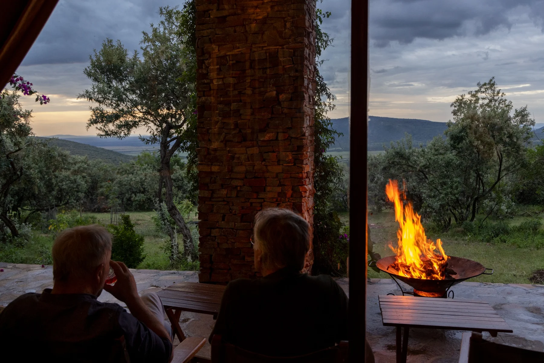 Enjoying the view beside the fire