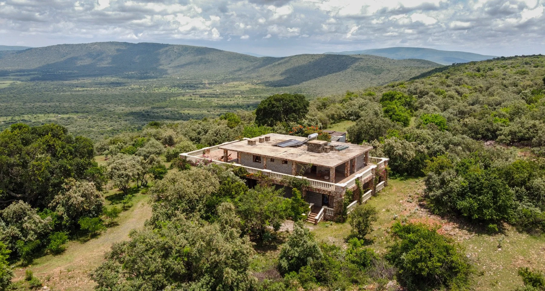 Aitong Crater House on its secluded green crater ridge